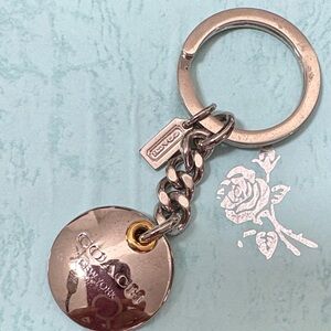 Nwot UNIQUE Coach Silver and Gold Keychain
has been put away for years